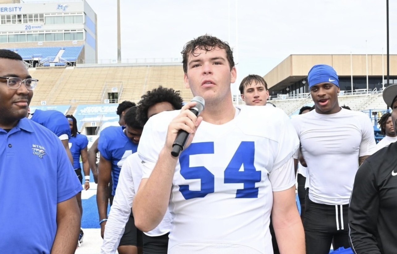 Connor speaking at the mic